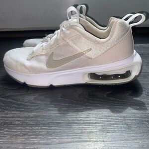 Beige Nike tennis shoes